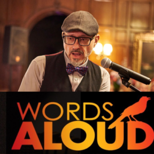 person speaking into microphone. text reads "words aloud"